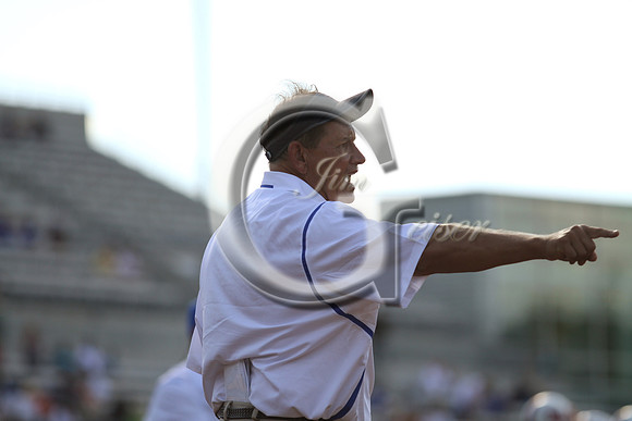 Coach directing his offense during warmups. 9/4/10
